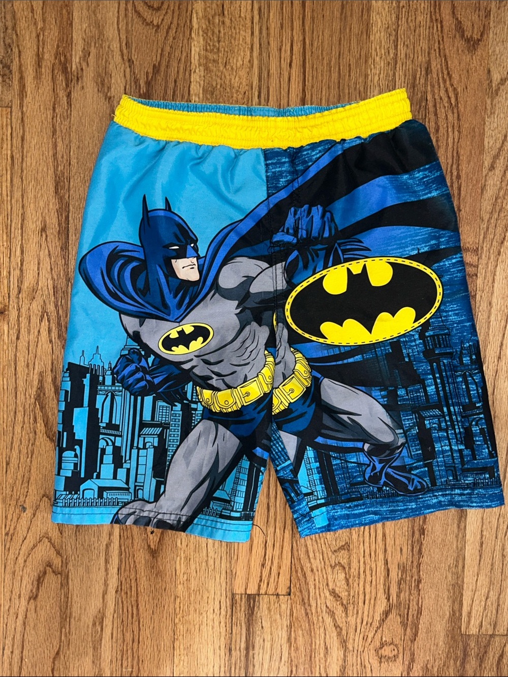 Boys Batman Blue and Yellow Graphic Swim Trunks Inner Tag Detail size 5T